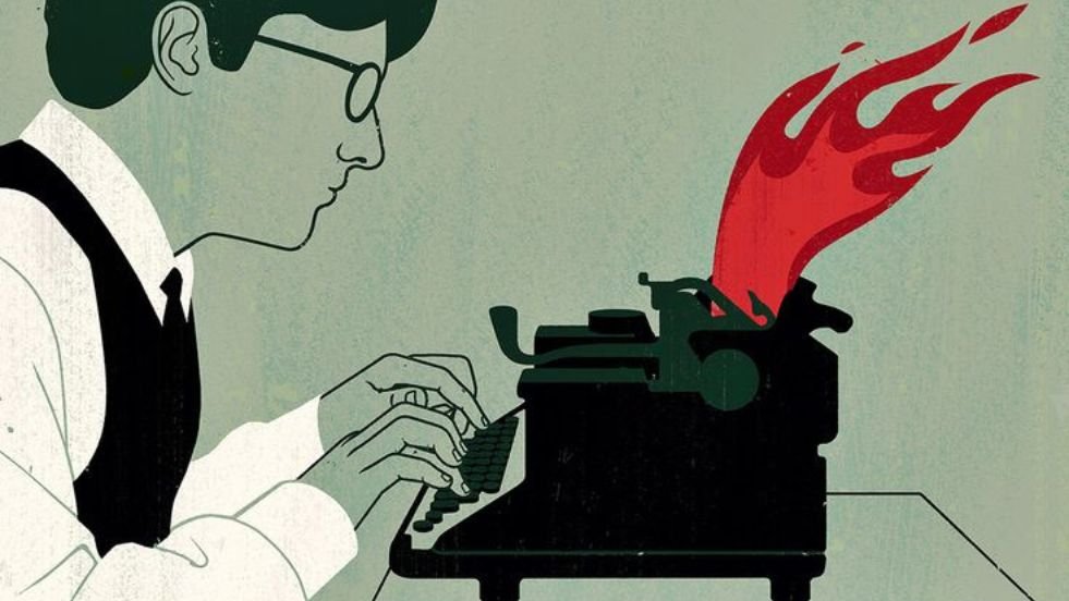 a man writing on typewriter